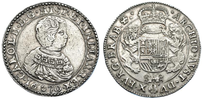 930   -  COLECCIÓN DE DUCATONES Y PATAGONES DE DOBLE PESO. CARLOS II. Doble ducatón. 1670. Amberes. A/ CAROL. II. D. G. HISP. ET. INDIAR. REX. R/ . ARCHID. AVST. DV-X. BVRG. BRAB . Zc. AR 64,93 g. DEL-325a (R2). DAV-4474. Mínimos golpecitos en gráfila. MBC-/MBC. Muy rara.