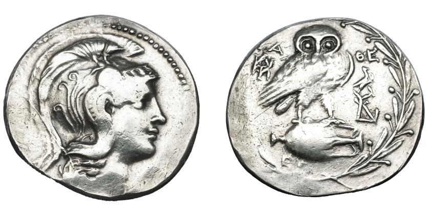 271   -  GRECIA ANTIGUA. ÁTICA. Atenas. A/ Cabeza de Atenea a der. R/ Lechuza encima de ánfora, en campo A-QE, dos monogramas y símbolo águila, debajo EU; alrededor corona de olivo. AR 16,12 g. 33,2 mm. COP-113 vte. SBG-2554 vte. Abrillantada. MBC-. Ex colección Guadán 2054.