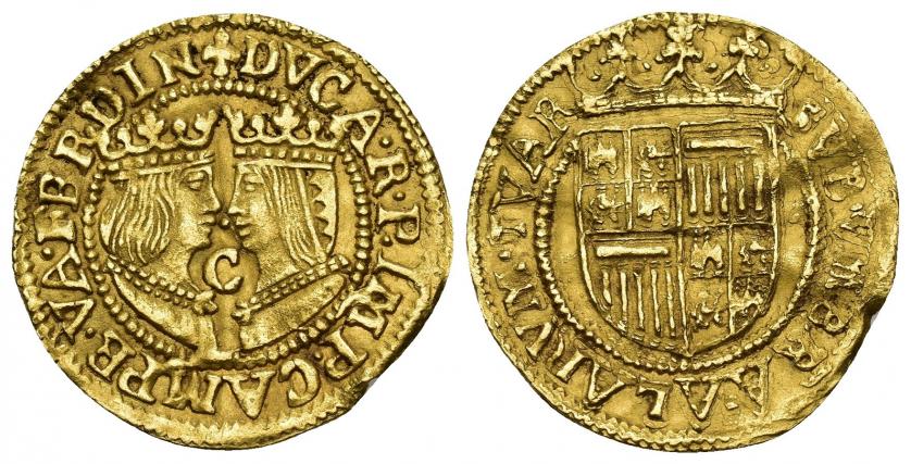 611   -  CARLOS I (a nombre de los Reyes Católicos). Ducado. Campen. A/ + DVCA.R.P.IMP.CAMPE.VA.FERDIN. Cruz al comienzo de la ley. R/ SVB. VMBRA. ALARVM. TVAR. AU 3,38 g. 24,35 mm. Del.II-1101 vte. Vanhoudt-No. Golpecito en canto. Ligeramente alabeada. MBC+/MBC.