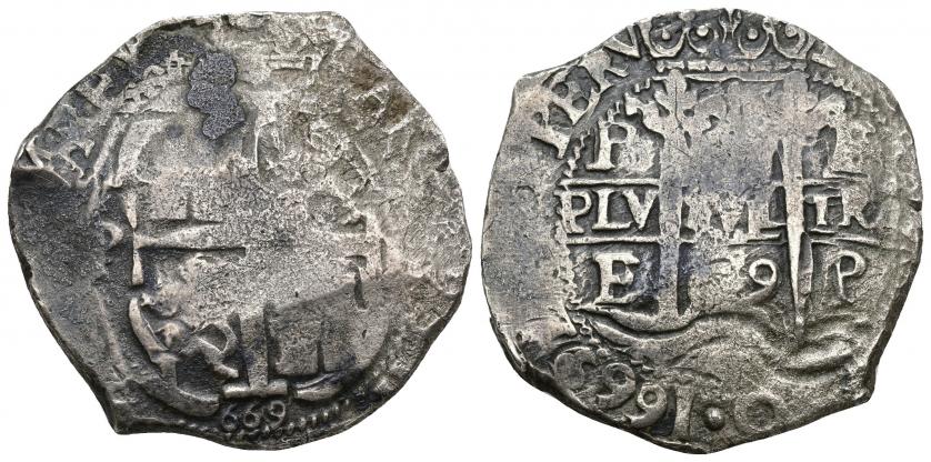 698   -  CARLOS II. 8 reales. Potosí. 1669. 3 fechas visibles. AR 24,9 g. 35,96 mm. AC-700. Oxidaciones y vanos. BC+/MBC.