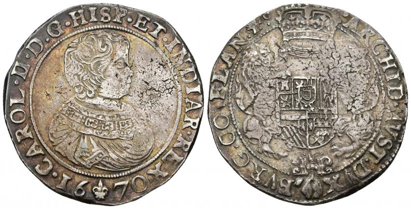 703   -  CARLOS II. Ducatón. 1670. Brujas. A/ CAROL II D G HISP ET INDIAR REX 1670. R/ ARCHID AVST DVX CO FLAN Zc. AR 32,6 g. 42,8 mm. Vanhoudt-692.BG. DEL I-327. Ligera plata agria. MBC.