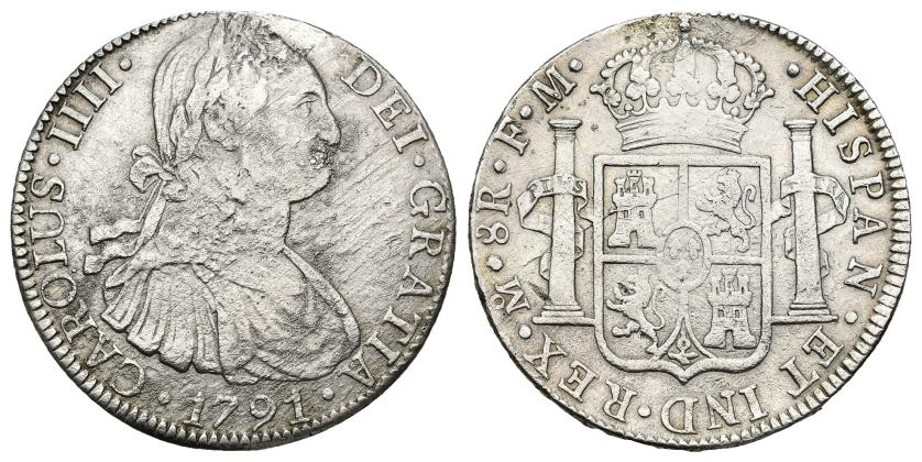 540   -  CARLOS IV. 8 reales. 1791. México. FM. AR 26,96 g. 39,6 mm. VI-787.  Fuertes erosiones. RC/BC+. 