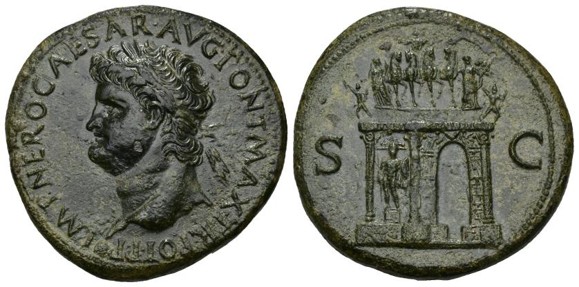 137   -  IMPERIO ROMANO. NERÓN. Sestercio. Lugdunum. (62-68 d.C.). A/ Cabeza laureada a izq.; IMP NERO CAESAR AVG PONT MAX TR POT P P. R/ Arco triunfal decorado, en la parte superior el emperador en cuadriga acompañado por Victoria y Pax, en campo S-C. AE 27,62 g. 35,3 mm. RIC-500. Pequeña erosión en anv. Pátina verde oscuro. EBC/EBC-.