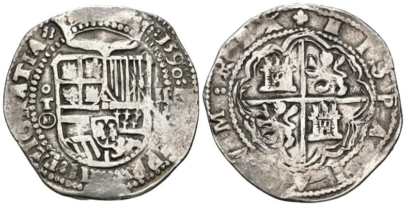 232   -  FELIPE II. 8 reales. 1590. Toledo. M dentro de círculo. AR 27,00 g. 39,4 mm. AC-752. Vanos en ley. MBC. Rara.