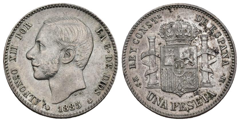 335   -  ALFONSO XII. 1 peseta. 1885 *18-85. Madrid. MSM. AR 4,93 g. 22,9 mm. VII-62. Leves oxidaciones limpiadas y sin limpiar. MBC+.