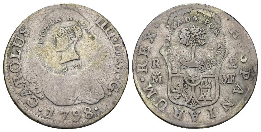 420   -  MONEDAS EXTRANJERAS. COSTA RICA. 2 reales. Doble resellocabeza femenina y árbol, sobre 2 reales 1798 Madrid MF. AR 5,75 g. 26,3 mm. KM-37. El resello MBC-. 