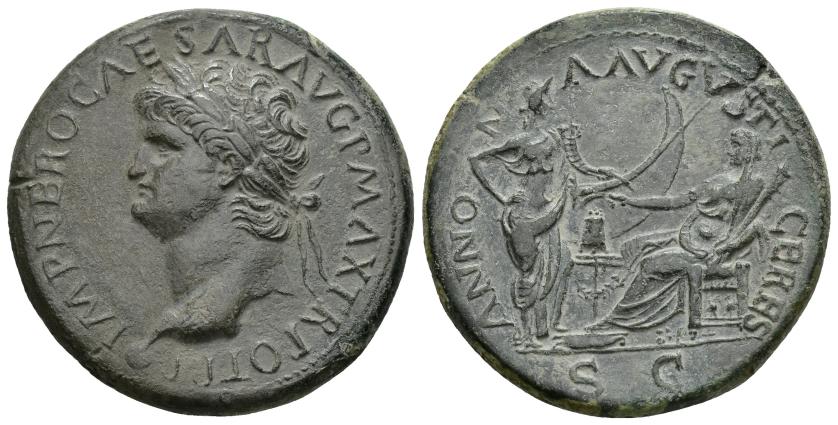 133   -  IMPERIO ROMANO. NERÓN. Sestercio. Lugdunum (67 d.C.). A/ Cabeza laureada a izq.; IMP NERO CAESAR AVG P MAX TR POT P P. R/ Annona a der. con cornucopia frente a Ceres sentada a izq. con espiga y antorcha, en medio modio y al fondo popa; ANNONA AVGVSTI CERES, exergo S C. AE 24,94 g. 36,3 mm. RIC-572. Pátina verde oscuro. MBC+. Rara.