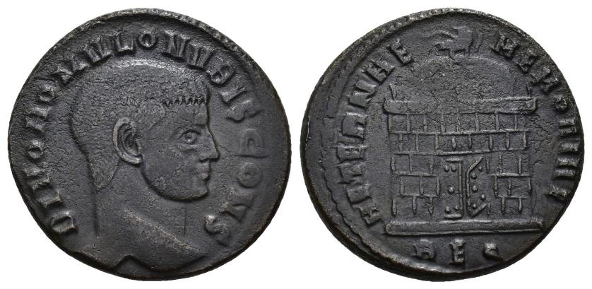 172   -  IMPERIO ROMANO. RÓMULO (bajo Majencio). Follis. Roma (310-311). A/ Cabeza a der.; DIVO ROMVLO N V BIS CONS. R/ Capilla abovedada con águila encima; AETERNAE MEMORIAE. -/-//REQ. AE 6,63 g. 24,1 mm. RIC-257. Acuñación floja en parte del rev. MBC.