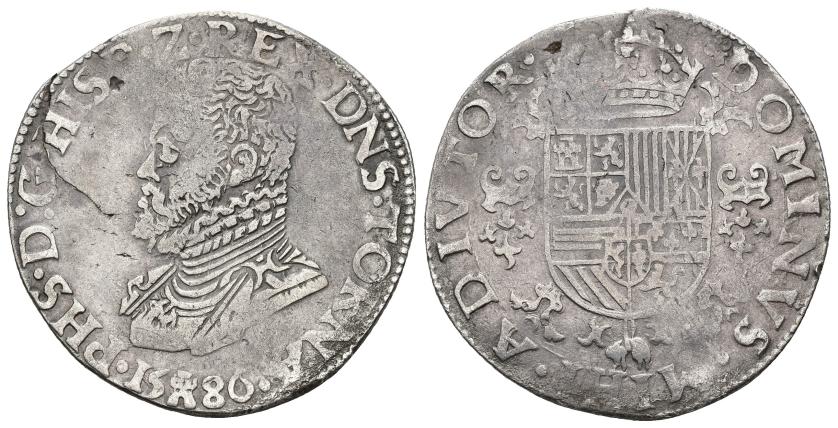 300   -  FELIPE II. 1/2 ducatón. 1586. Tournai. AR 16,68 g. 35,7 mm. Vanhoudt-364TO. DEL-53. Defecto de cospel en anv. MBC-.