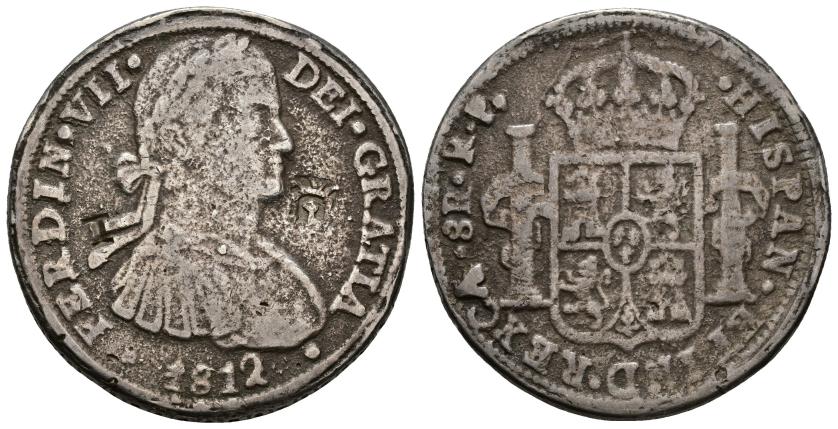 434   -  FERNANDO VII. 8 reales. 1812. Chihuahua. RP. Fundida. 2 resellos. AR 27,43 g. 40,57 mm. VI-967. MBC para esta serie.