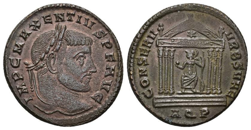 3114   -  IMPERIO ROMANO. MAJENCIO. Follis. Aquileia (307-310). A/ Cabeza laureada a der.; IMP C MAXENTIVS P F AVG. R/ Roma dentro de templo tetrástilo; CONSERV VRB SVAE. -/-//AQP. AE 6,77 g. 25,3 mm. RIC-121a. MBC+. 