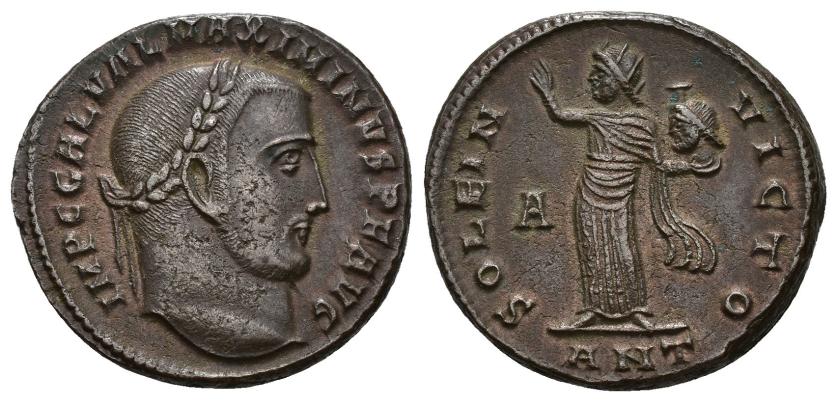 3140   -  IMPERIO ROMANO. MAXIMINO II. Follis. Antioquía (312). A/ Cabeza laureada a der.; IMP C GAL VAL MAXIMINVS P F AVG. R/ Sol a izq. con cabeza de Serapis en izq.; SOLI INVICTO, A/-//ANT. AE 6,74 g. 22,8 mm. RIC-167 vte. (marca ceca). Metal mal batido en anv. MBC+/EBC-. 