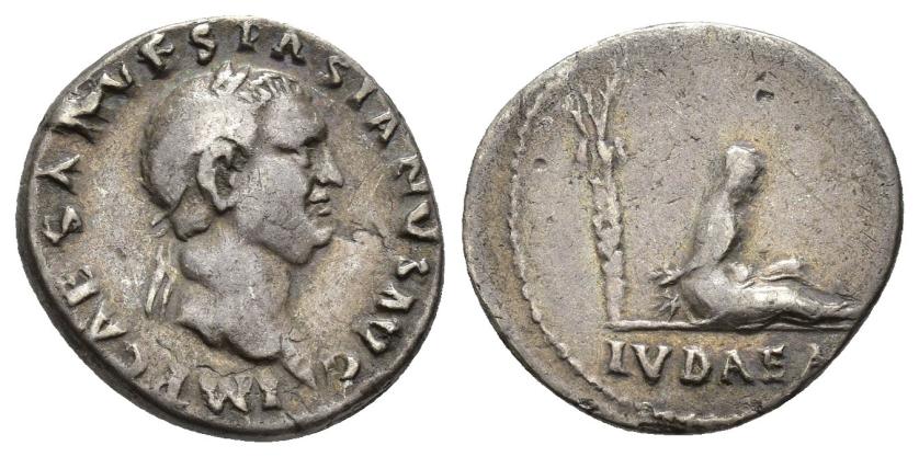 2377   -  IMPERIO ROMANO. VESPASIANO. Denario. Roma (70 d.C.). A/ Busto laureado a der.; IMP CAESAR VESPASIANVS AVG. R/ Judea sentada con manos atadas a la espalda, detrás palmera; exergo IVDAEA. AR 3,38 g. 17,6 mm. RIC-4. Pequeñas marcas de acuñación. MBC-. Rara.