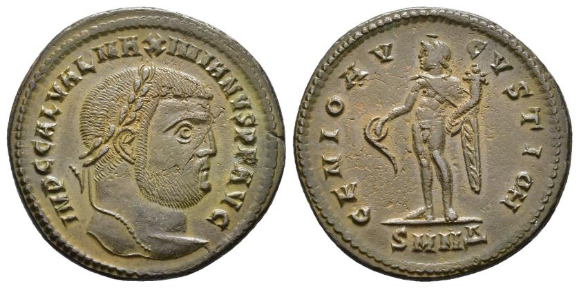 2412   -  IMPERIO ROMANO. GALERIO. Follis. Nicomedia (308-310). A/ Cabeza laureada a der.; IMP C GAL VAL MAXIMIANVS P F AVG. R/ Genio a izq. con pátera y cornucopia; GENIO AVGVSTI. -//SMNA. AE 7,35 g. 27 mm. RIC-54a. Raya en anv. MBC+.