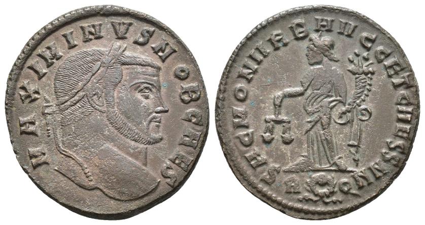 2421   -  IMPERIO ROMANO. MAXIMINO. Follis. Roma (306). A/ Cabeza laureada a der.; MAXIMINVS NOB CAES. R/ Moneta a izq. con balanza y cornucopia; SAC MON VRB AVGG ET CAESS NN. -//R(corona)Q. AE 8,43 g. 28,1 mm. RIC-159a. MBC+.