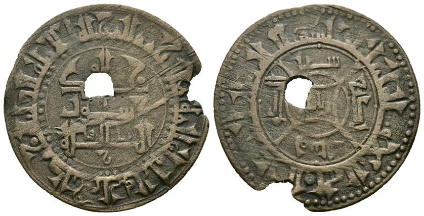 1103   -  QARAJANÍES. GRANDES JANES. MUHAMMAD B. 'ALI (393-415/1002-1024). Felús. Ilaq. 404 H. CU 2,53 g. 27 mm. Zeno-53284. Perforación y rotura al borde. MBC.