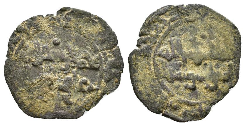 878   -  CALIFATO FATIMÍ. ABU 'ALI MANSUR AL-HAKIM (386-411/996-1021). 1/4 dinar. Sin ceca. Sin fecha. CU 0,8 g. 16 mm. Tipo Nicol-1635. Alma de cobre para ser dorada. Posible falsificación de época. Roturas al borde. BC.