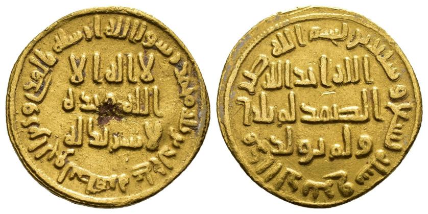 929   -  CALIFATO OMEYA. ABD AL-MALIK (66-87-/685-705). Dinar . Sin ceca. 79 H. AU 4,26 g. 20 mm. Bernardi-42. Defecto de cospel en el centro del anv. MBC+.