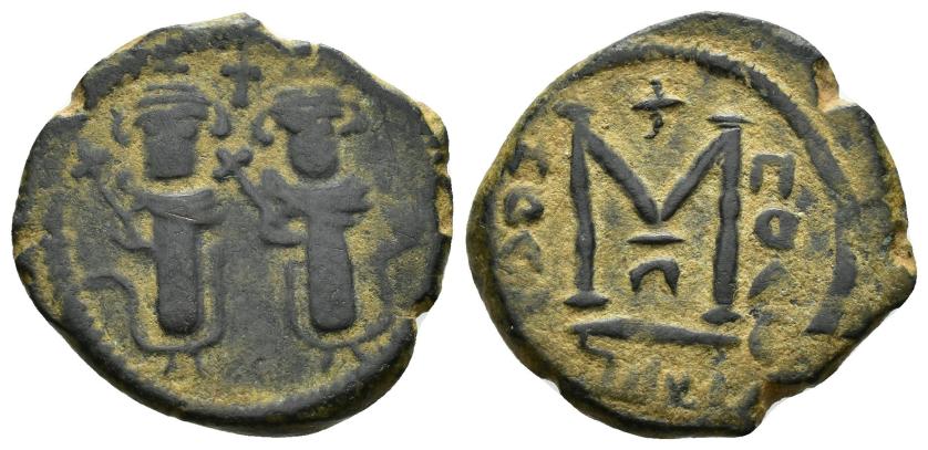 992   -  CALIFATO OMEYA. ABD AL-MALIK (66-87-/685-705). Felús. Baalbek. 692-94 H. CU 4,26 g. 20 mm. Walker I-189. MBC-/MBC.